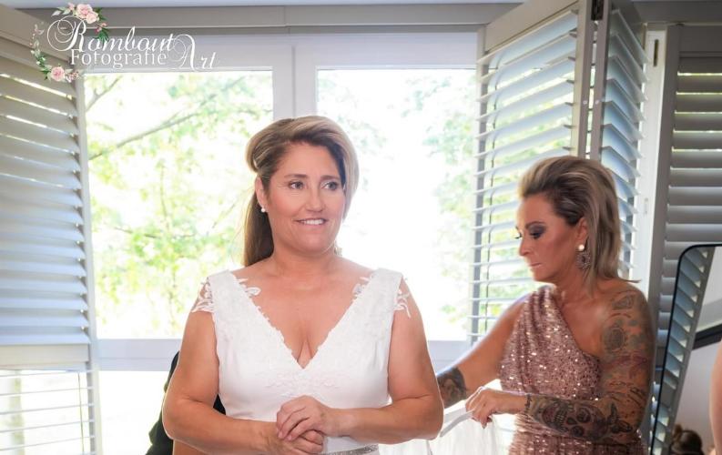 makeup is applied to a bride