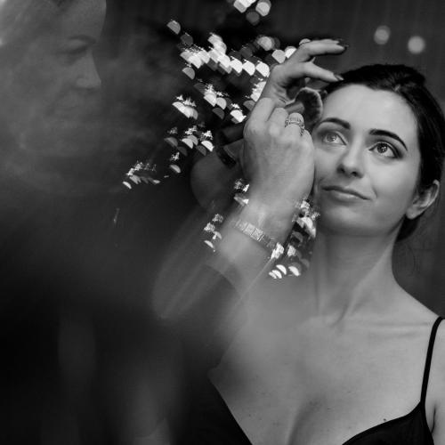 makeup is applied to a bride