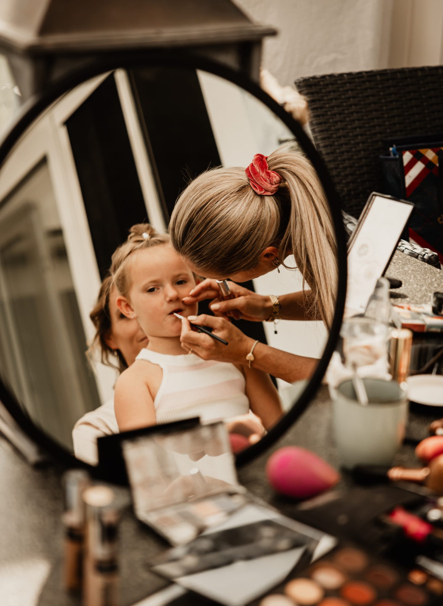 makeup is applied to a bride